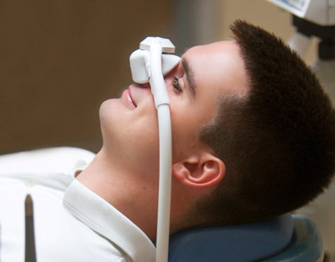 Male dental patient under effects of nitrous oxide sedation in Edison, NJ