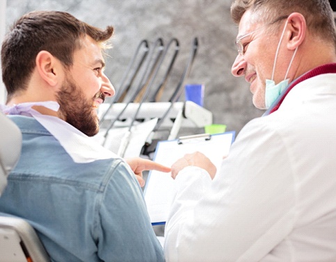 Dental patient learning about his Horizon BlueCross BlueShield of NJ coverage