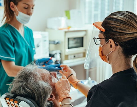 man getting tooth-colored fillings in Edison 