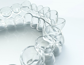 Closeup of Invisalign in Edison on white background 