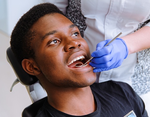 Man receiving dental checkup