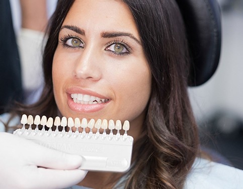 woman smiling with porcelain veneers in Edison 