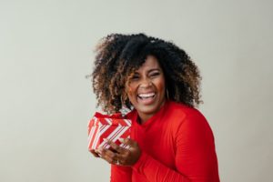 a woman with a healthy smile during the holidays